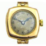 An Art Deco 9ct gold cased lady's wristwatch, circular silvered dial, black Arabic numerals and
