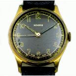 A vintage Novoris gold plated gentleman's wristwatch, circa 1950, circular black dial with gold