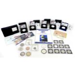 A collection of US proof and uncirculated silver dollars, including two 999 fine silver proof one