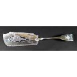 A George III silver fish slice, with fiddle back pattern handle and decorated with pierced