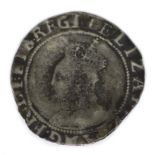An Elizabeth I silver shilling, possibly circa 1590s, with heavily rubbed portrait and long cross