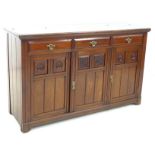 A Victorian Aesthetic period mahogany sideboard, with three drawers over three cupboards, a/f