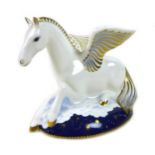 A Royal Crown Derby paperweight, modelled as Pegasus, limited edition numbered 995/1750, with gold