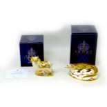 Two Royal Crown Derby paperweights, one modelled as a crocodile, 6cm high, and a visitor centre
