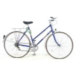 A vintage Sun Solo blue painted lady's bicycle, 170 by 52 by 103cm high.