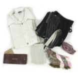 A traditional German Lederhosen outfit, including a white shirt, size 41, black suede leather