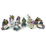 A group of nine Royal Doulton figurines, comprising "The Old Balloon Seller", H.N.1315, 18cm