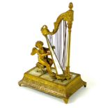 A French Palais Royale ormolu jewel stand incorporating a music box, early 19th century