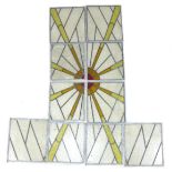 A set of ten 1930-40s stained glass window panels with sunburst design, a/f, approximately 46 by