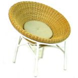 A modern wicker chair, circa 2010, after the Terence Conran C8 'cone' chair designed in 1954, with a
