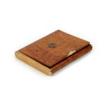 A European gold mounted rectangular burr walnut hinge lidded cigarette case, retailed by Dunhill,