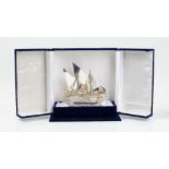 A model of a twin masted sailing ship, detailed 800, having gilt highlights,