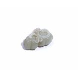 A Chinese pale celadon jade carving of lotus pods, Qing dynasty, 7cm wide.