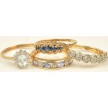 A 9ct gold and diamond ring, designed as a row of seven clusters, ring size M,