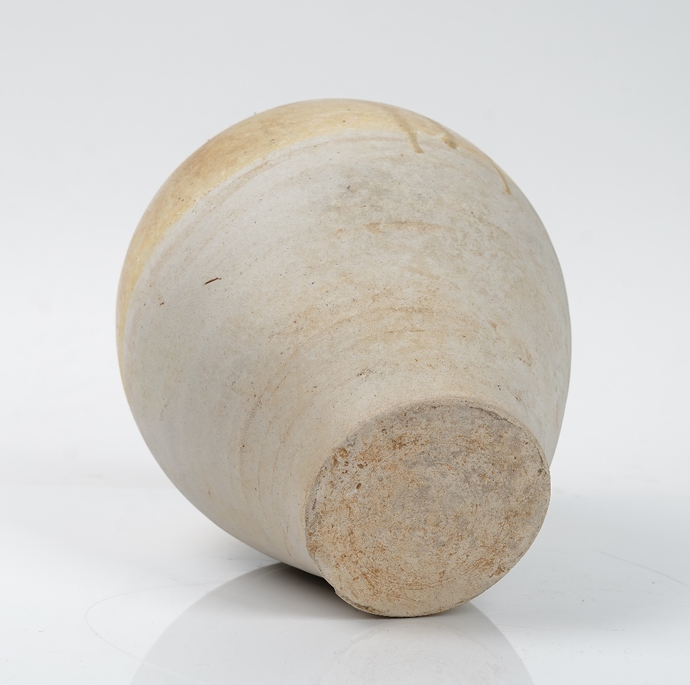 A Chinese Liao style pottery vase, of ovoid form, the top half covered in a deep cream glaze, - Image 3 of 3