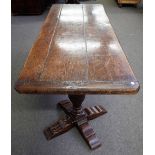 A Tudor style oak refectory table, the cleated planked rectangular top,