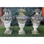 A set of three Vicenza stone sectional finials formed as fruiting jardinieres,