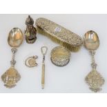 A pair of Dutch cast silver fancy spoons, English Import marks for London 1891, with figural scene,