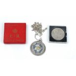 A white gold mounted silver Solomon Islands commemorative thirty dollars 1975,
