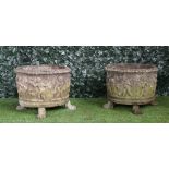 A pair of reconstituted stone circular jardinieres,