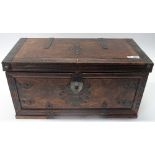 A graduated pair of Indian iron bound teak rectangular trunks, the larger 60cm wide x 30cm high,