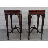 A pair of George III style mahogany tray top kettle stands, each with candle slide,