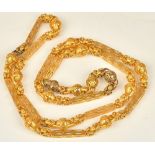A Victorian gold longchain, in an integral pierced bar and multiple link design, mid 19th century,
