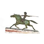 An Art Deco patinated spelter sculpture of an Amazon on horseback, mounted on a stepped marble base,