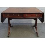 A George III mahogany sofa table, with opposing opposite frieze drawers, on four downswept supports,