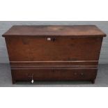 An 18th century oak mule chest, with moulded hinged top over one long drawer,