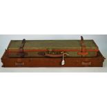 John Dickson & Son, Edinburgh, a leather bound canvas shotgun travelling case, 83cm wide,