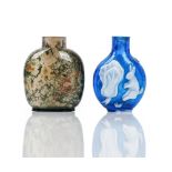 A Chinese white overlay blue glass snuff bottle, each side with a rabbit and vegetable,