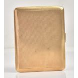 A 9ct gold rectangular cigarette case, presentation engraved within, the exterior engine turned,