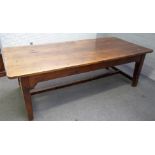 A 19th century oak kitchen table, the rectangular plank top on square supports,