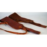 Brady, Halesowen, two leather and canvas gun slips, 127cm and 121cm long, (2).