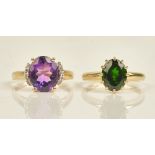 A 9ct gold ring, claw set with an oval cut diopside, ring size N and a 9ct gold ring,