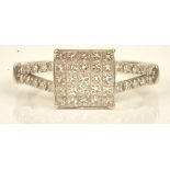 A diamond set square cluster ring, mounted with princess cut diamonds,
