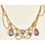 A gold and amethyst necklace,