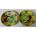 A pair of small Chinese yellow-ground incised dragon dishes,