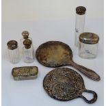 A group of silver mounted toilet and dressing table wares, comprising; two mirrors,