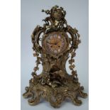 A 19th century French Louis XVI style gilt-bronze figural mantel clock,