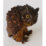 An Austrian cold painted bronze model of an owl hunched over, unsigned, 9.5cm high.