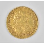 A Spanish Charles III gold half escudo, 1772 PJ, weight 1.8 gms.
