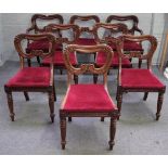 A set of eight William IV mahogany kidney back dining chairs, on tapering reeded supports,