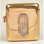 A 9ct gold rectangular vesta case, the front with a match striking panel, otherwise plain,