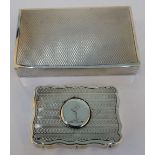 A silver rectangular hinge lidded box, the interior gilt, the exterior engine turned, length 8cm,