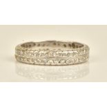 A diamond set full eternity ring mounted with two rows of circular cut diamonds, ring size U,