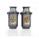 A pair of Chinese cylindrical blue-ground vases, 20th century,