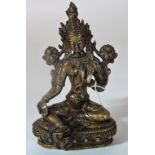 A Tibetan bronze figure of Green Tara,