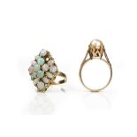 A gold and opal marquise shaped cluster ring,